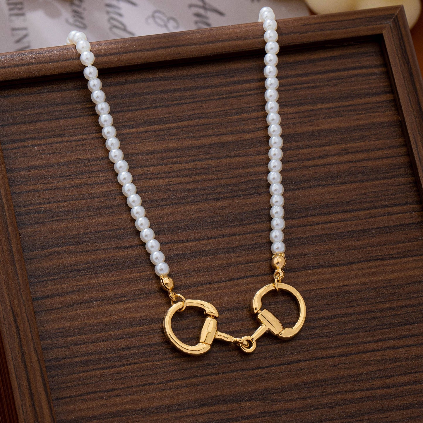 Horsebit Centerpiece Faux Pearl Strand Necklace