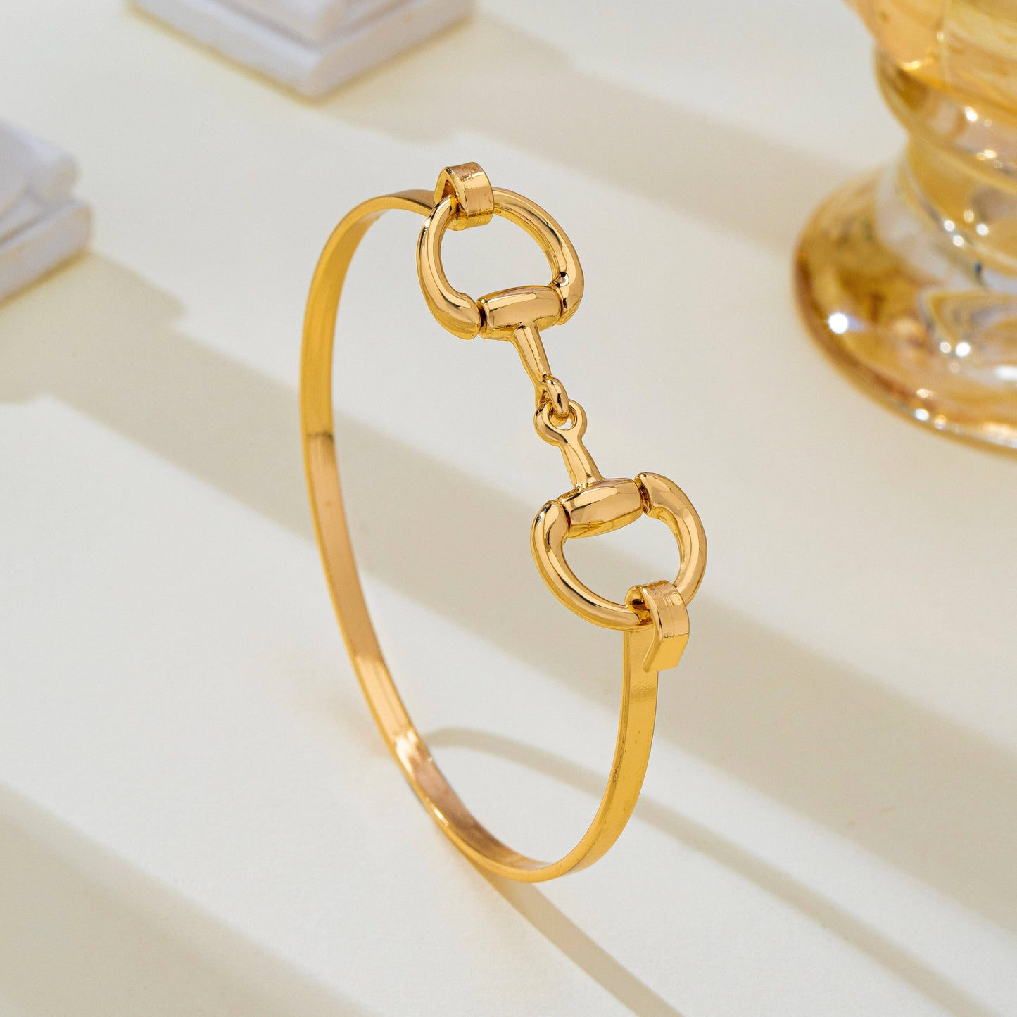 Horsebit Centerpiece Gold-Tone Bangle Bracelet