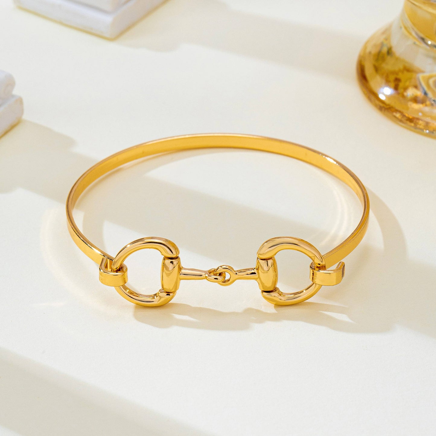 Horsebit Centerpiece Gold-Tone Bangle Bracelet