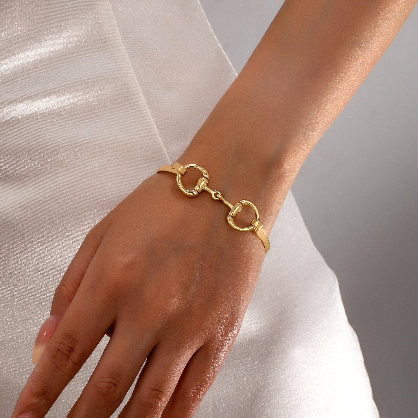 Horsebit Centerpiece Gold-Tone Bangle Bracelet